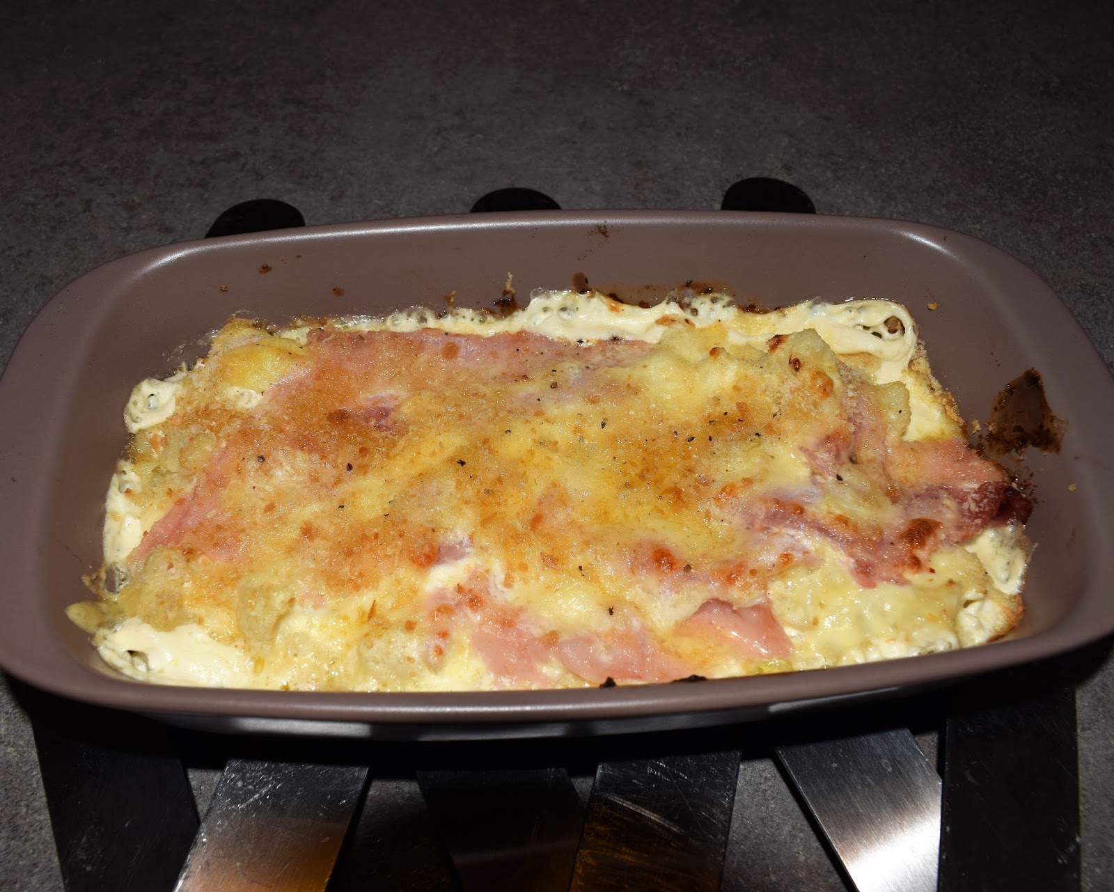 CAULIFLOWER AU GRATIN WITH NOSTRALE OF ONCINO CHEESE, RACLETTE, HAM AND