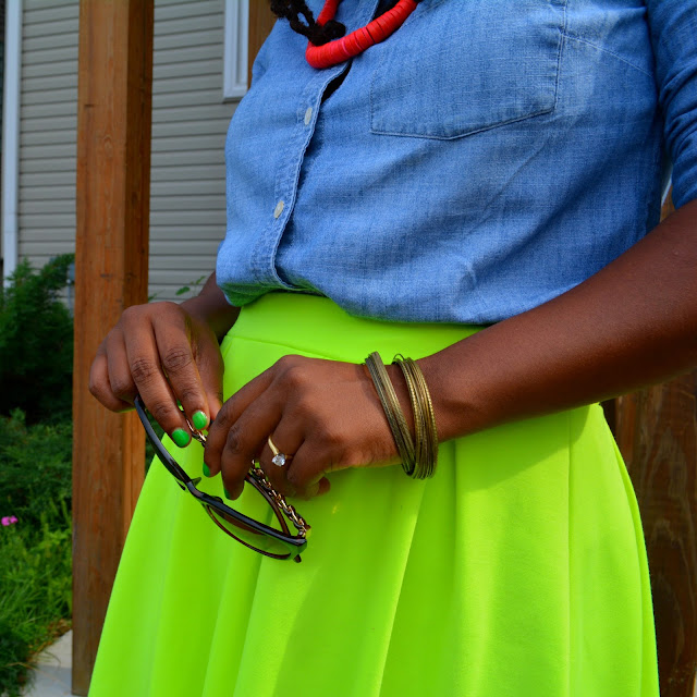 neon skirt worn with denim shirt