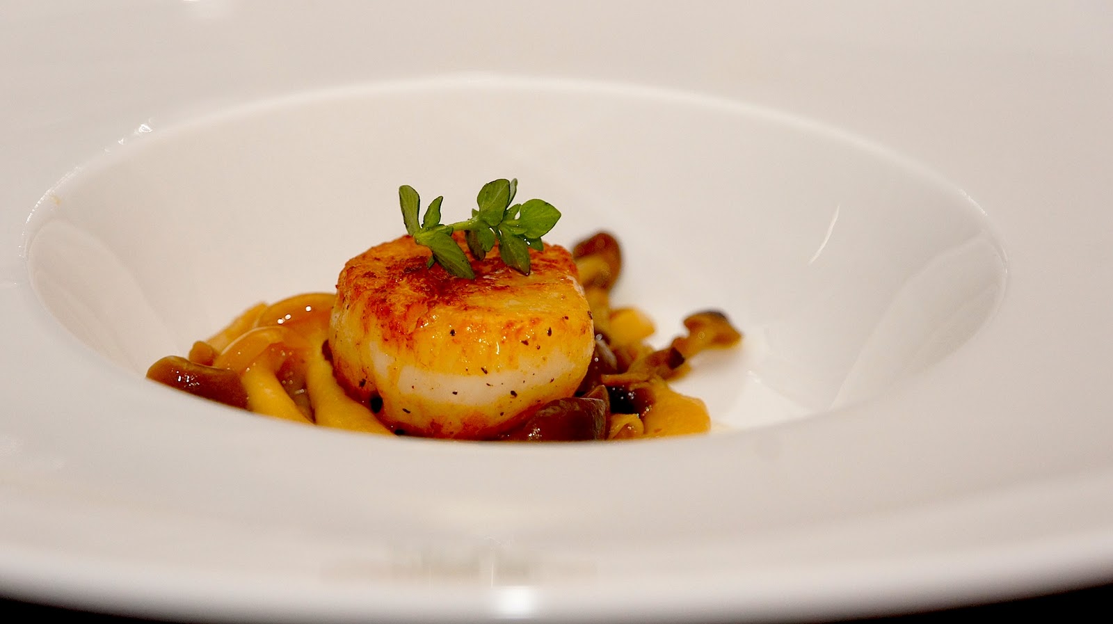 Chef and Sommelier Pan Seared Scallop served with mushroom in mirin