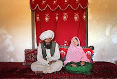 Afghanistan wedding. He is 40 years old, she is 11.