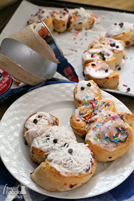 Transform your favorite refrigerated cinnamon rolls into fun and easy to make edible snowmen with these Grands! Snowmen Cinnamon Rolls.