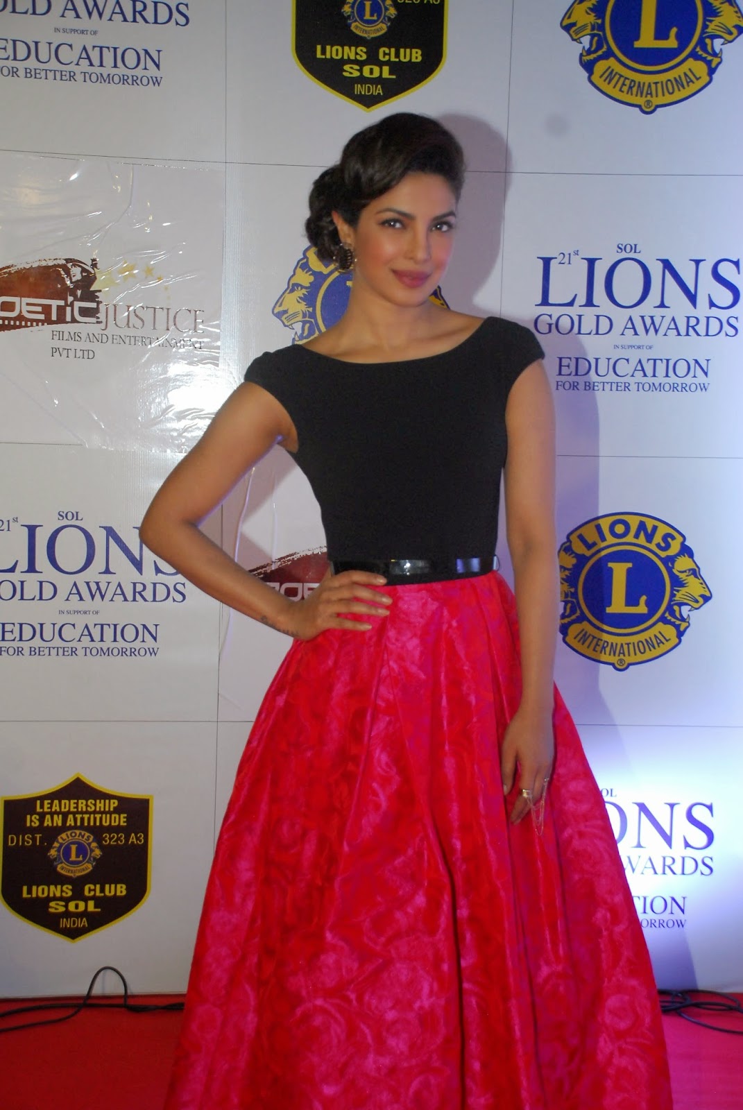 Actress Priyanka Chopra In Black Top Red Skirt At Awards Function