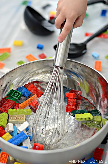 Working on fine motor skills with LEGO sensory soup - simple water sensory play for kids from And Next Comes L