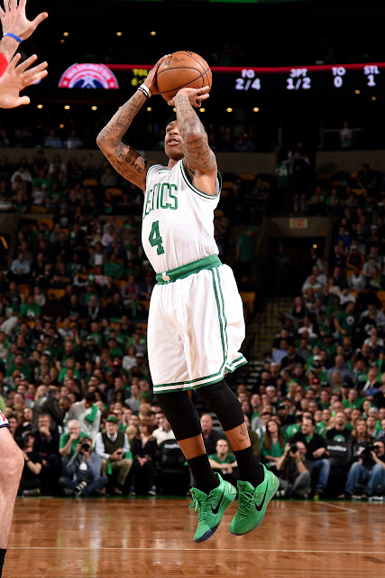 Isaiah on the court in his green Nike Kobe A. D.'s - same he as a Celtic