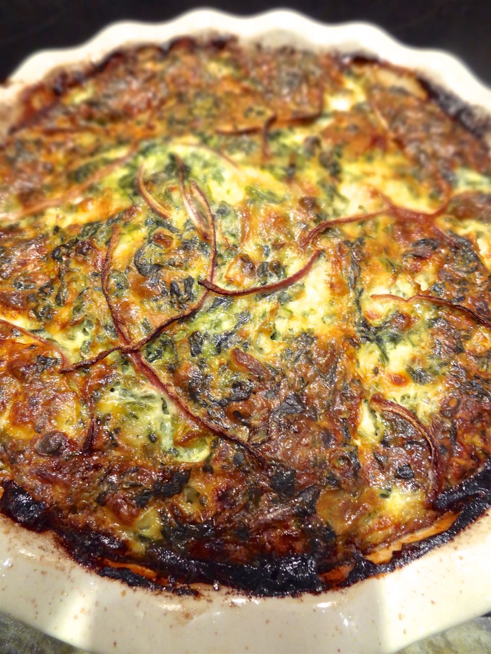 Scrumpdillyicious Crustless Cheese & Spinach Quiche with Red Onion