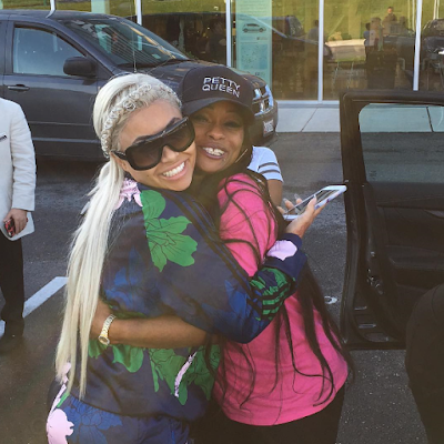 Blac Chyna gets a hug from her mother after receiving a car gift from her