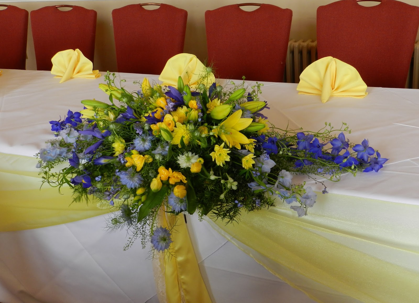 Sandra's Flower Studio. Blue and Yellow wedding flowers