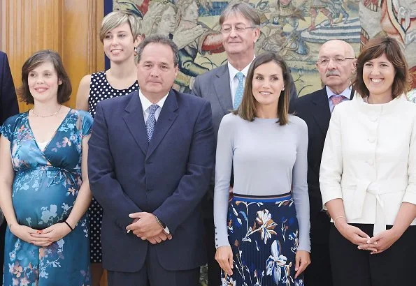 Queen Letizia wore Hugo Boss Fayme crew neck wool sweater, and Hugo Boss Viplisa Skirt, Magrit blue pumps