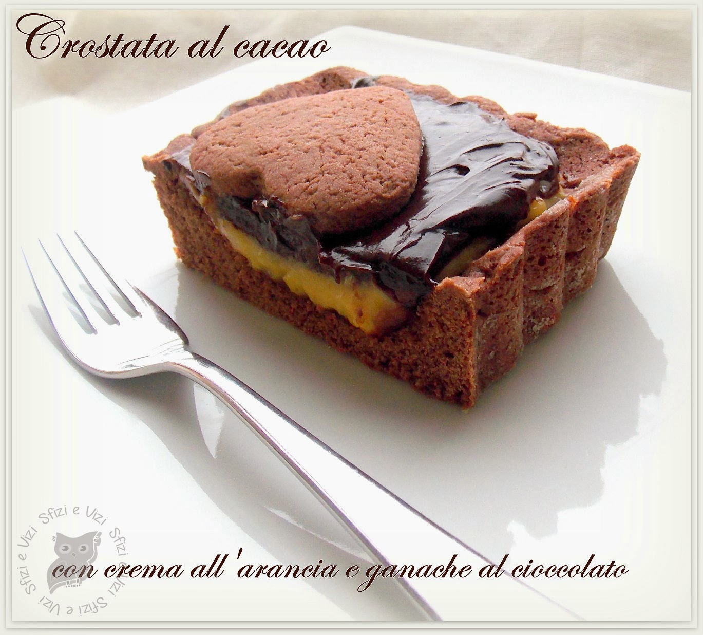 crostata al cacao di ernst knam con crema alle arance e ganache al cioccolato - ricetta senza latticini -