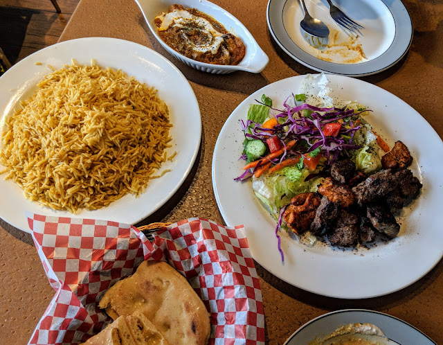 Different Afghan dishes on the table from Afghan Chopan Bakery and Diner
