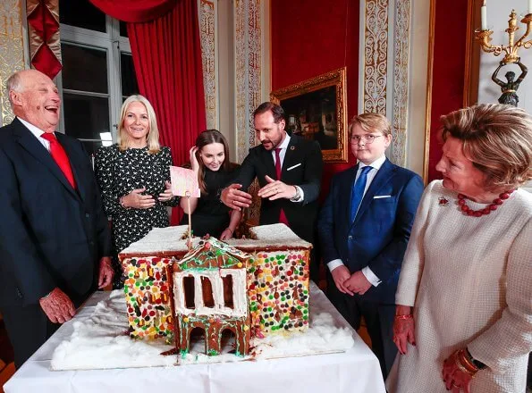Princess Ingrid Alexandra, Sverre Magnus and Queen Sonja. Crown Princess Mette-Marit wore a white dove bird-print dress