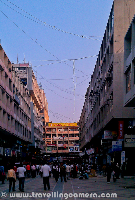 Although Nehru Place is mainly known for it's computer hardware market which is considered as largest one in Asia, but there are lot many other things to observce around this place. For now, let's have a quick Photo Journey with my HTC Desire HD and it's mainly focussed on Nehru Place Market and places visible from this part of the Delhi...-------------------------------------------------------------------------------The very first photograph of this Photo Journey shows a view of Iskon Temple which is visible from Metro Station. Nehru Place is well connected with Metro Train now, which starts from Centeral Scretriate.Here is first view after getting down from Metro Station at Nehru Place. Very Crowded places with some Autos lined up to take their clients to appropriate places, but on thier terms. Satyam Cinemas is just in front of Nehru Place Metro Station, as you can see in above Photograph. After crossing the road and Satyam Cinema, we enter into a huge Market-complex behind Satyam Cinema. This is extremely fast moving region, where everyone is rushing towards various Computer Hardware shops to check out different products with respect to specifications, cost, new technologies etcHere is typical view of Nehru Place Market where it's surrounded by multi-storey buildings from all sides. All these floors have various Computer Hardware dealers, shops and assembling service providers. In fact, there are some of the very large scale dealers for various branded computers and other equipments like Printers, Scanners, Extrenal Hard Disks etc.There is very strong network of dealers in this market, which ensures that no one is cutting much on the rates to avoid overall loss of this market. Their benefit is always in ensuring standard ranges for different types of computer components. Although customer may get higher prices, as many of them come to this market without proper home-work around the prices & configurations. I have seen many people going to this market with an impression that they get good stuff at cheaper rates and end up with cheaper rates for old configurations...There are some of the shops at Nehru Place Computer hardware Market where rate lists with appropriate specifications are pasted and you have to just order the component you want. No scope of negociations and success rate of such shops is seen much more than other dealers. As of now, I am forgetting the name of a dealer who is very popular for fixed priced computer components and located on first floor.Here is one of the sample from fixed priced shop at Nehru Place computer hardware market in national capital region of India - Delhi !!!Apart from Computer Hardware other stuff like cloths, shoes etc are also sold on the streets of Nehru Place Market. All this stuff is non-branded and most of the times low quality. But some of the use & throw electronic stuff is quite cheap in this marketApart from main computer shops and street shops, few boys can be seen roaming around this place. They sell pirated Softwares for 50 Rs to 200 Rs, depending upon the kind of software you want. At times, you can get a good deal of having 4-5 softwares in 100 rupees. Latest versions of almost all the softwares can be seen in this market. Everyone knows about this fact including government.There are some of the eating points around this place and people spend complete day in searching for right stuff. Many folks for surrounding states come to this market to buy Computer Components in whole-sale and book profits in their local regions.With all these basic details about Nehru place market, it was time to leave the place and move towards our homes. Sunset was beutiful on that day and we were missing our cameras at this point of time, but still HTC Desire helped in capturing these moments for usNehru Place market is surrounded by some of the other intersting places like Bahai's Temple (Lotus Temple) and Iskon Temple. Lotus temple is one of the main tourist places in Delhi, India and Iskon Temple is a paradise for peace lovers. It's exactly in Kailash Coloy from where Lotus temple is also clearly visible. There are some light and sound shows at this temple, which are mainly around stories of Radhe Krishna