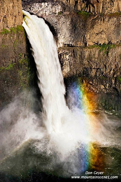 A rainbow forms at the base of Palouse Falls, Palouse Falls State Park, Washington.