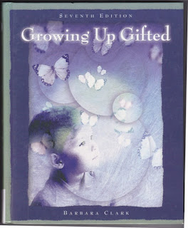 Book cover shows child looking at butterfly on tree limb with flowers