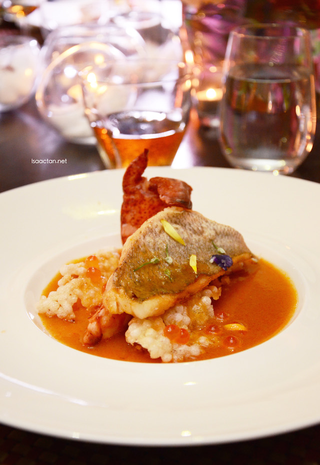crispy skin snapper and lobster with crispy sago infused with saffron and lobster reduction