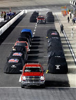 Trucks parked on pit road due to weather. #NASCAR Trucks parked on pit road due to weather. #NASCAR
