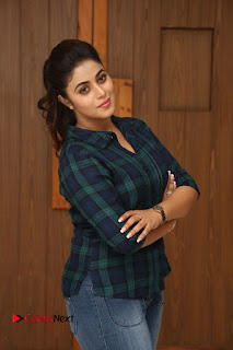 Actress Poorna Stills in Denim Jeans at Jayammu Nischayammu Raa Movie Interview  0164