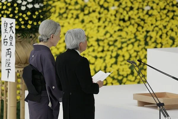 Emperor Akihito and Empress Michiko at a memorial service for war victims at the Nippon Budokan