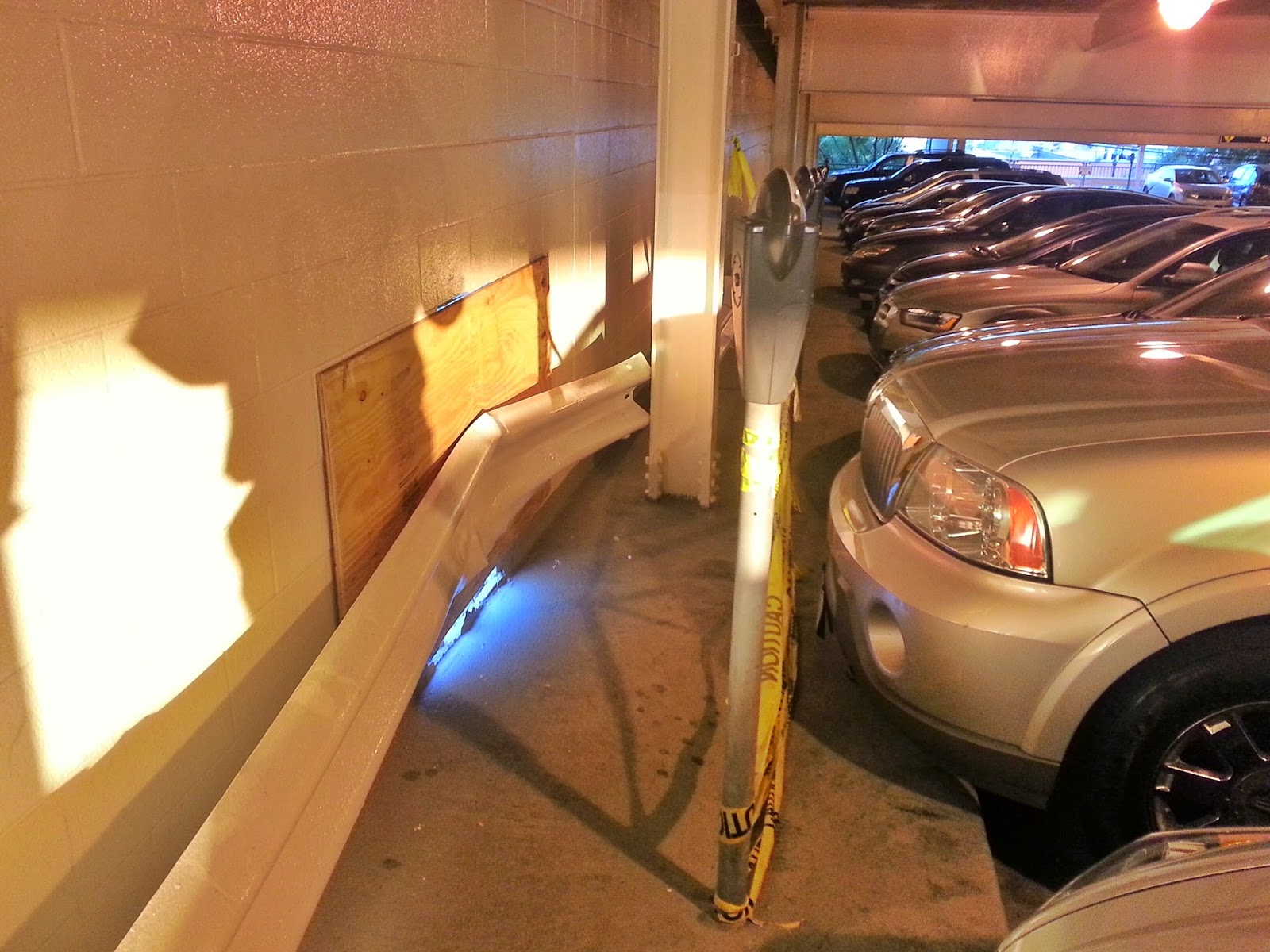 Robert Dyer Bethesda Row CAR CRASH IN BETHESDA GARAGE LEAVES HOLE