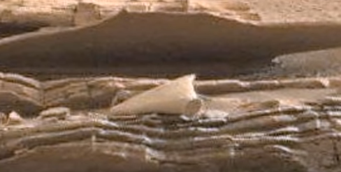 Here is an odd shaped object on Mars that looks totally intelligently made. Here is an odd shaped object on Mars that looks totally intelligently made.