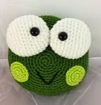http://www.ravelry.com/patterns/library/decorative-frog-pillow-pal
