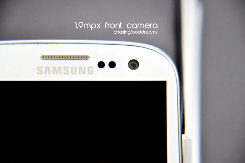Close-up shot of a Samsung smartphone camera lens, highlighting its advanced technology.