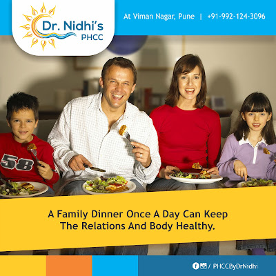 Eating while watching television or smart phone may result in obesity a family eating in front of T.V