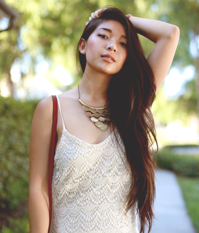 Stephanie Liu of Honey & Silk wearing Chaser lace maxi dress and Chloe and Isabel jewelry