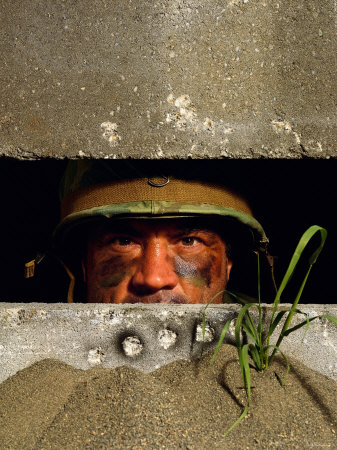 stocktrek-images-soldier-in-bunker.jpg