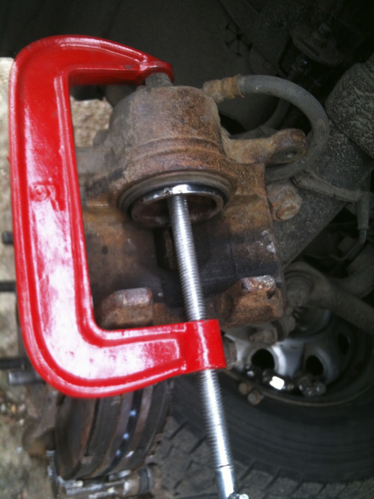 At Grommit's garage Cleaning stuck brake pistons