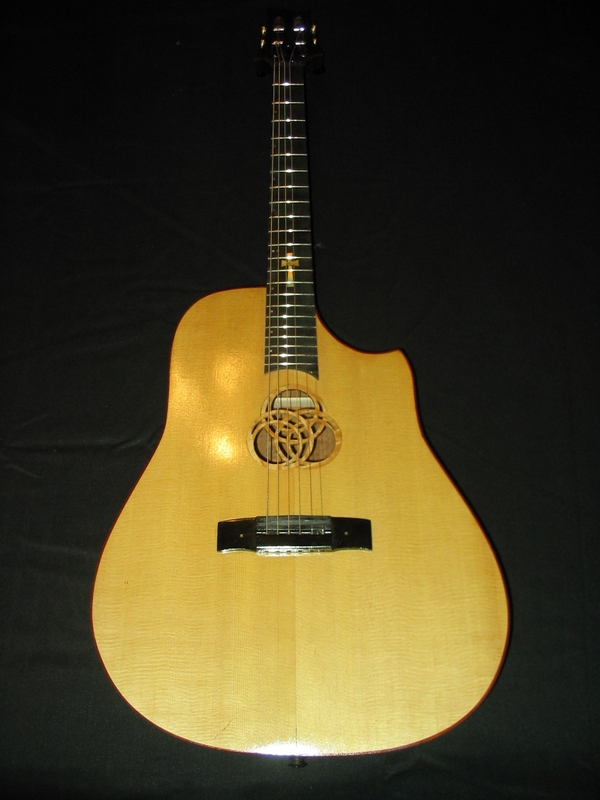 Jim's page Single Cut acoustic guitar with slotted pedhead