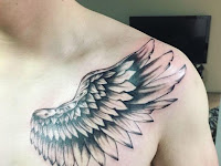 Small Eagle Wings Tattoo On Chest