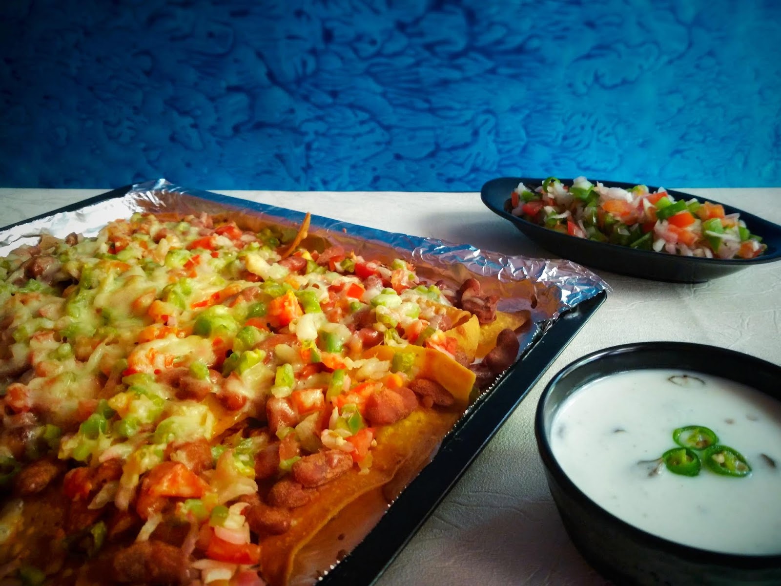 Nachos Supreme with Kidney Beans and Veggies Loaded Vegetarian Nachos