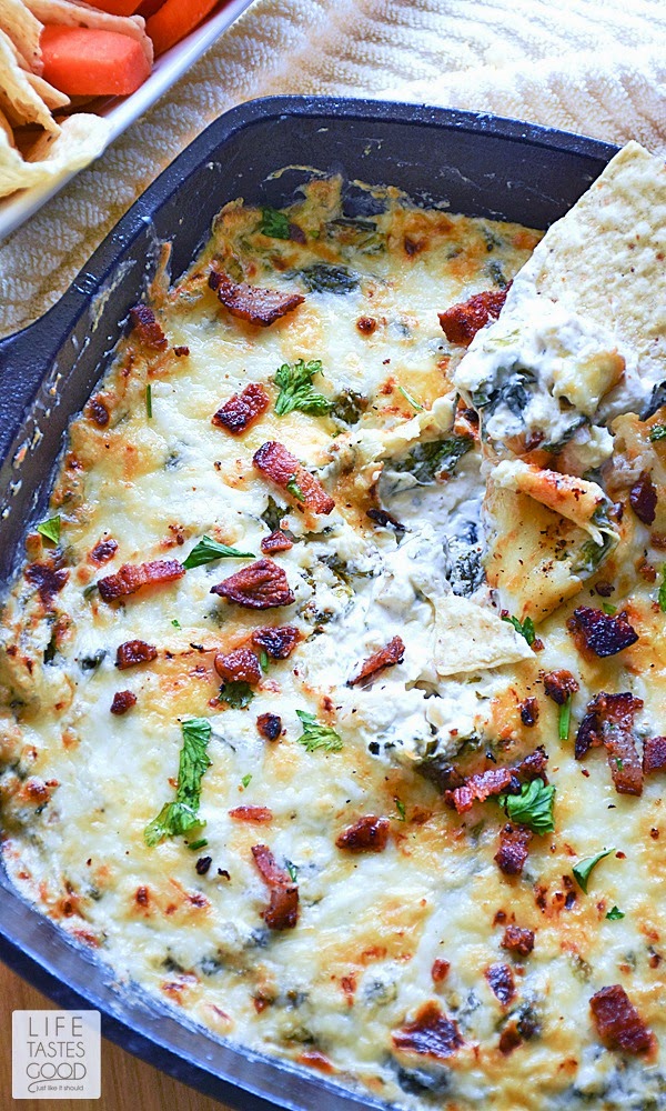 Cheesy Kale and Bacon Dip | by Life Tastes Good is a tasty mix of cheeses, kale, bacon, and a splash of wine for that little extra somethin' somthin' <wink>. This appetizer dip is delicious served hot or cold and goes great with vegetables, chips, crackers, you name it! It is a real winner with the added bonus of having good-for-you kale mixed in.
