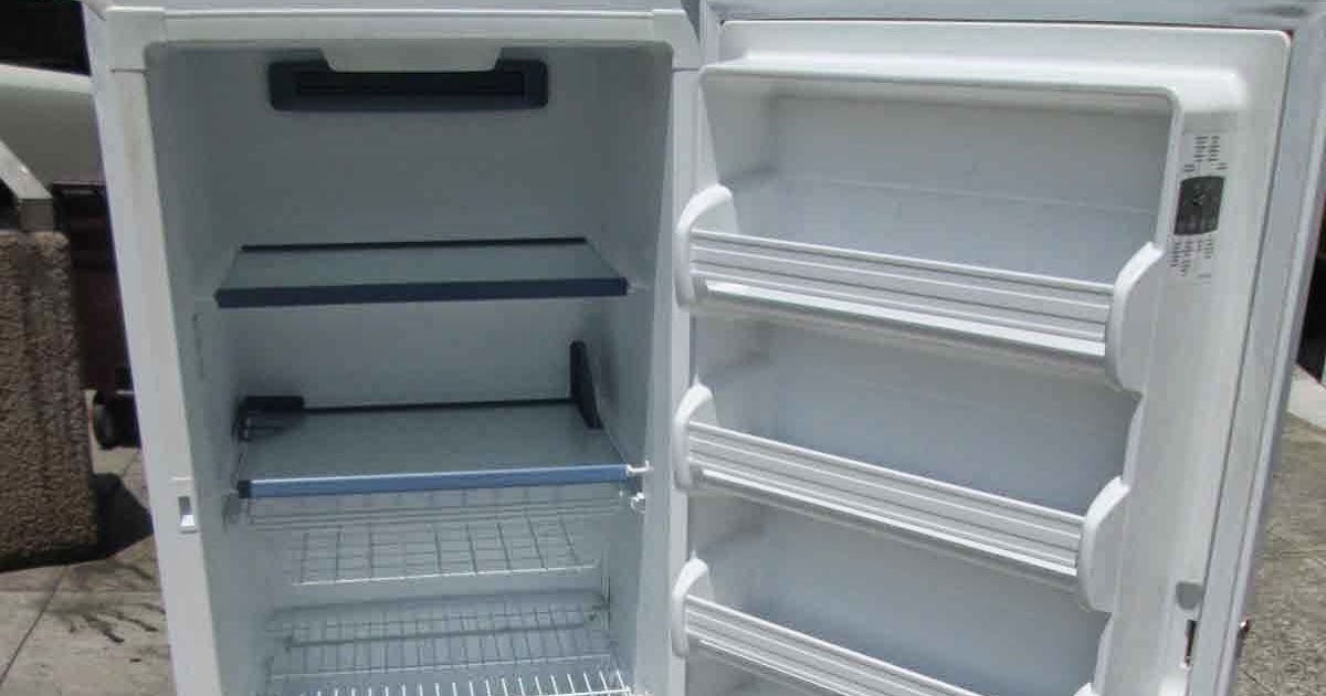 UHURU FURNITURE & COLLECTIBLES: SOLD 2010 Kenmore Elite Upright Freezer