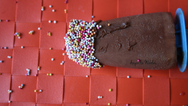A 3 Ingredient Nesquick and Nutella Popsicle with a Sugar Dot Mess from www.anyonita-nibbles.com