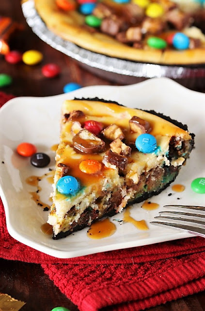 Candy Bar Cheesecake Pie image ~ a perfect recipe for leftover Halloween candy.
