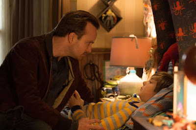 Aaron Paul and Aiden Longworth in The 9th Life of Louis Drax