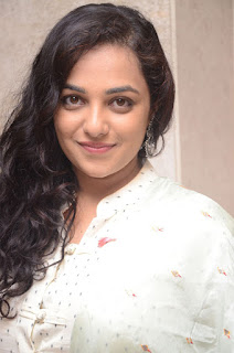 nitya menon at 100 days of love audio launch nitya menon at 100 days of love audio launch