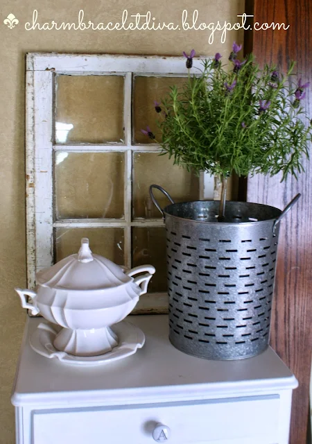 lavender topiary in an olive bucket with an ironstone soup tureen