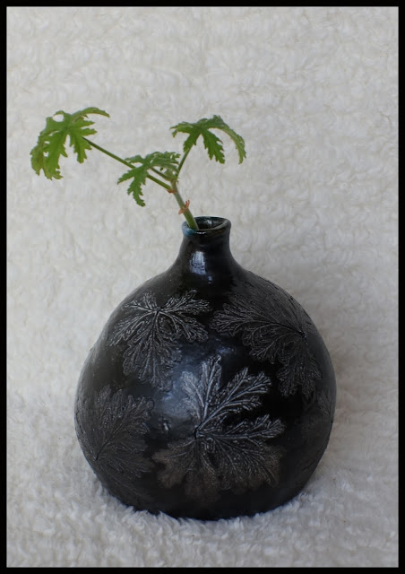 Black beauty - soda fired leaf imprint ceramic vase by Lily L.