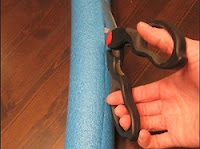 Cut a slit halfway through the long way - cutting through from the outside to the hole that is already in the middle Image: Cut a slit halfway through the long way - cutting through from the outside to the hole that is already in the middle