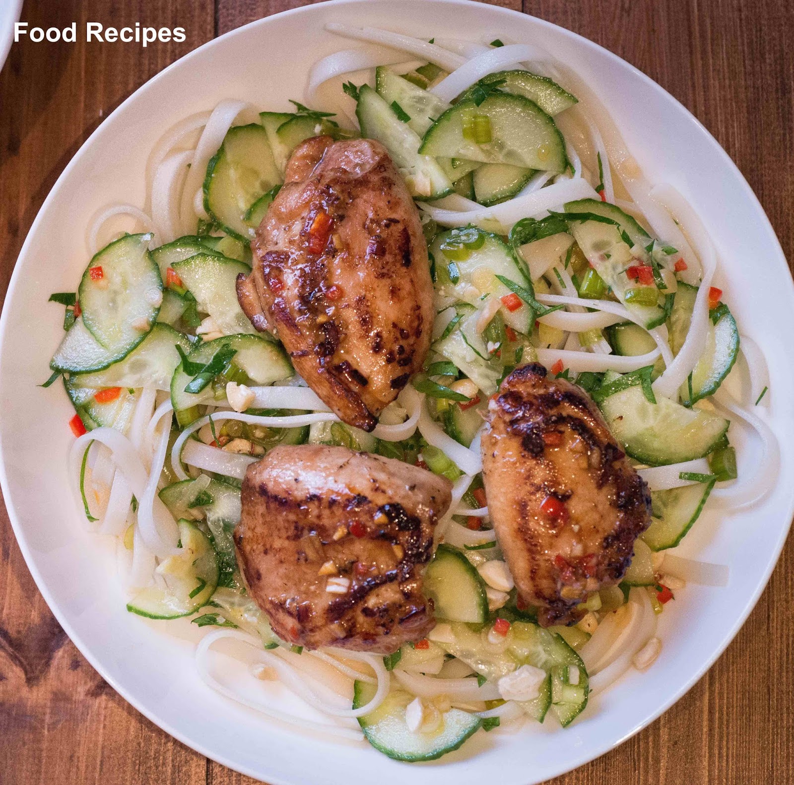 Chicken thighs with cucumber & cashew salad