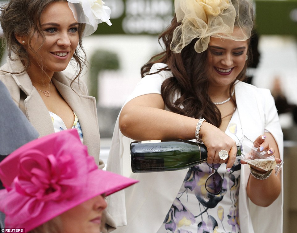 Today Friday start up with Racegoers Ladies Day in finest outfits as they a...