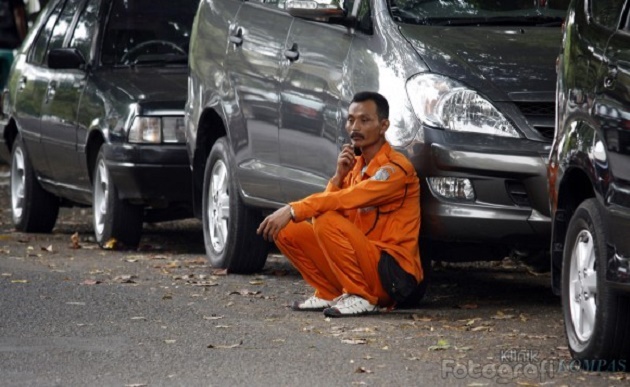 Inilah Alasan Kenapa Tukang Parkir Tetep Pantas Kamu Bayar
