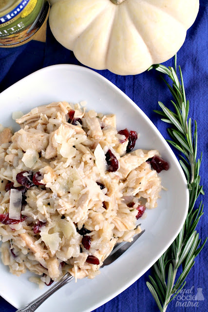 Creamy risotto comes together with fresh rosemary, leftover holiday turkey, sweet & tart cranberries, & flavorful cooking wine in this comforting Holiday Turkey & Cranberry Risotto.
