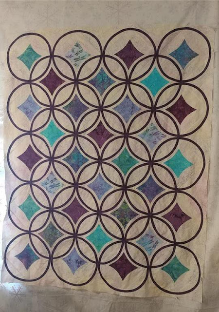 Moonrise quilt by Slice of Pi Quilts using Lavendula fabrics by Island Batik