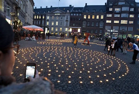 Princess Marie of Denmark, together with her children Prince Henrik and Princess Athena at Gammeltorv square