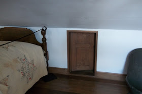 Underground Railroad = Secret attic access slide bed over to hide the door.