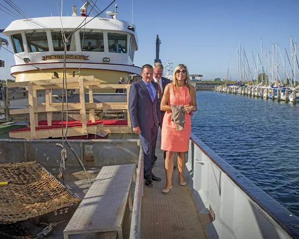 Queen Maxima visits in the province Zeeland. Queen Maxima wore NATAN Dress, Natan shoes, Velentino sunglass, Chanel clutch